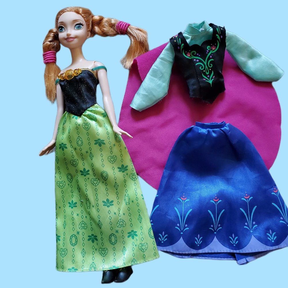 Princess Anna of Arendelle with change of clothes in good preowned condition.